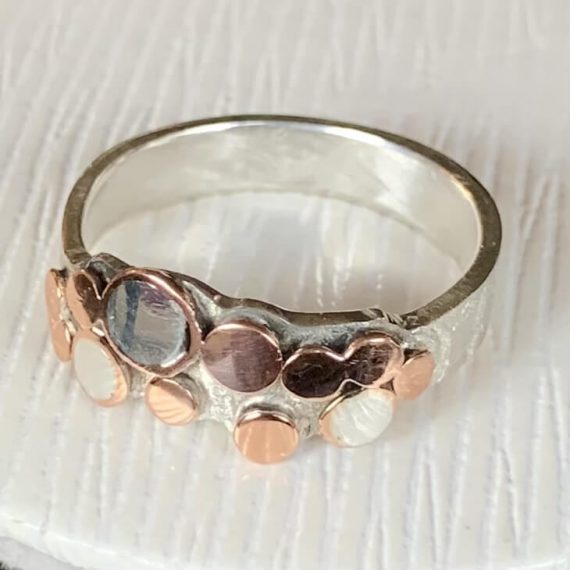 Fine silver and copper flattened and polished on a sterling silver band