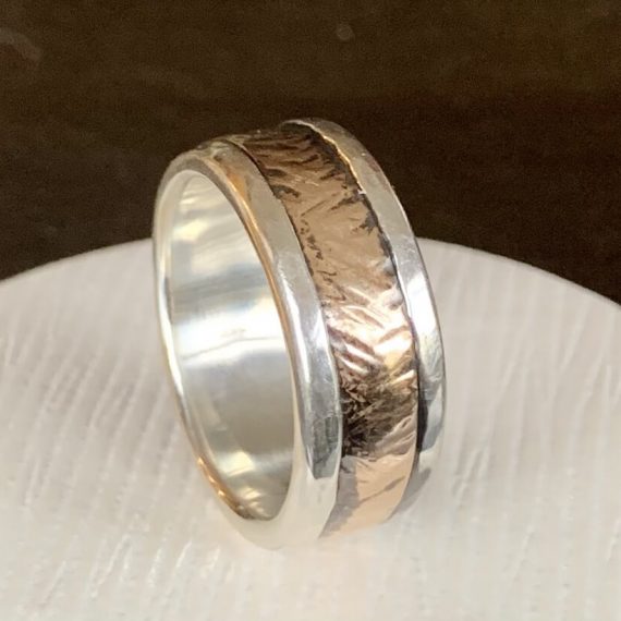 Sterling silver band with bronze inlay, distressed and oxidized